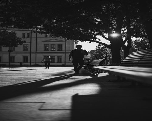 People taking a relaxing morning walk in an Indonesian city park